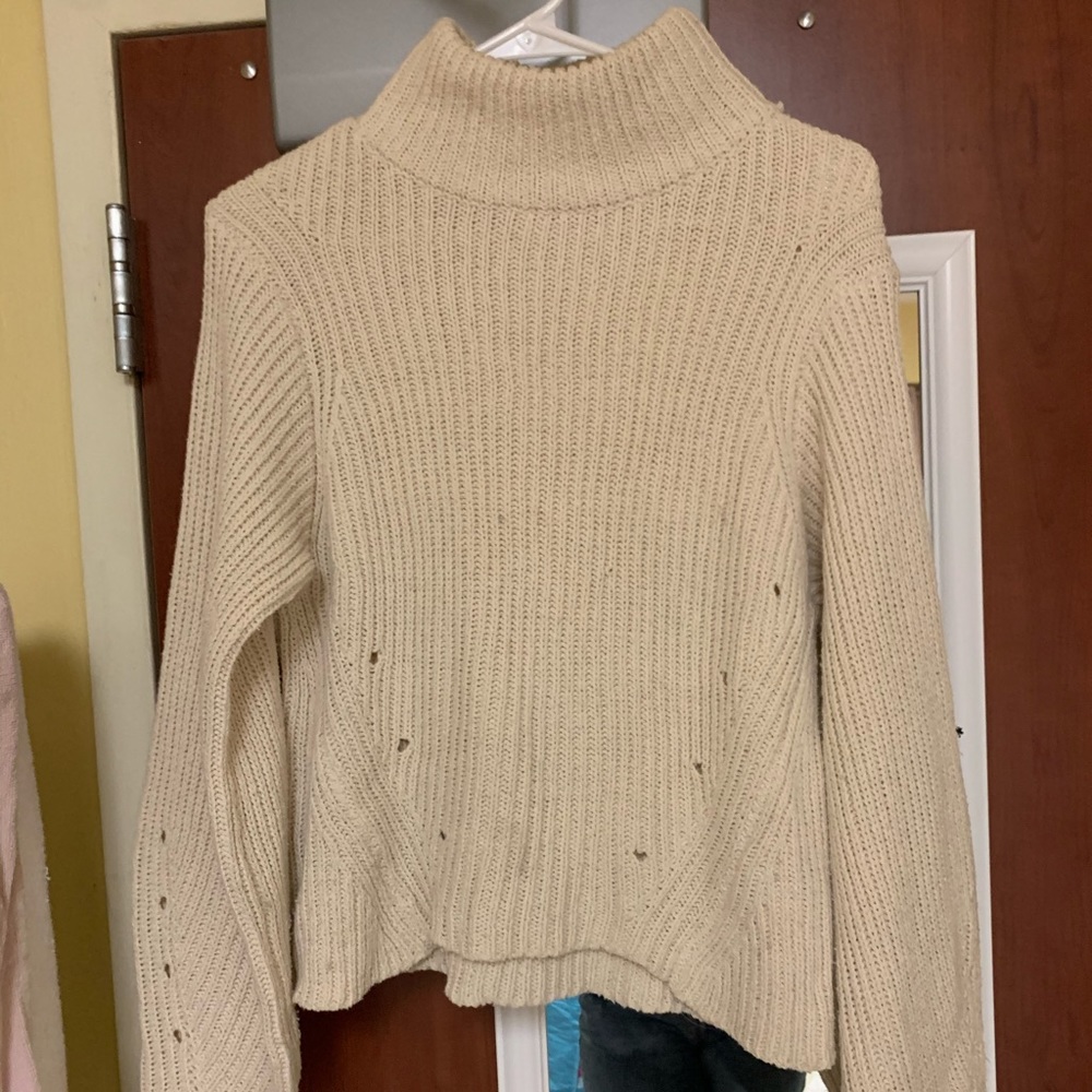beige turtleneck sweater